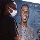 Mourners attend a funeral service for Jonathan Price at Wolfe City High School Football Field on October 10, 2020 in Wolfe City, Texas. Price, 31, was fatally shot by Wolfe City police officer Shaun Lucas on October 3, 2020 after Price was allegedly trying to stop a domestic dispute.